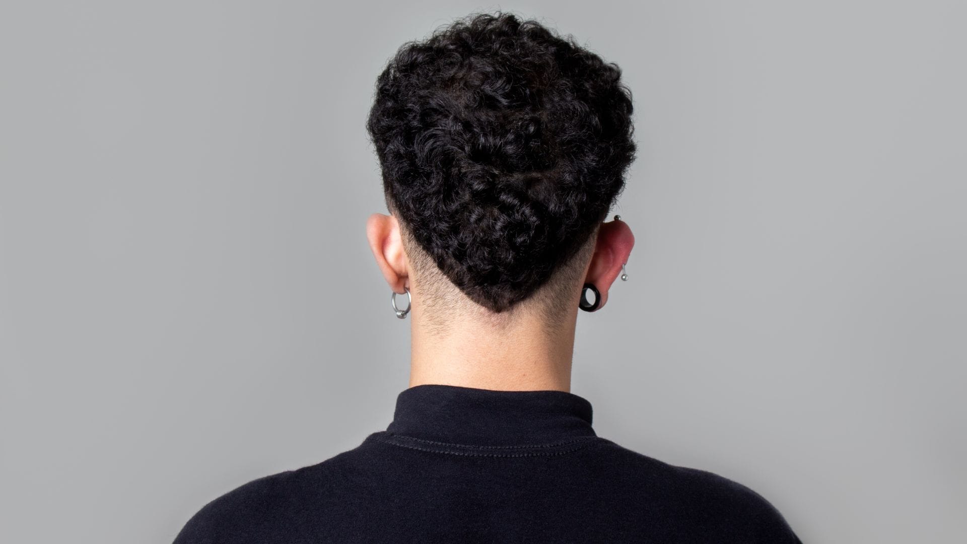 13 Popular Haircuts for Men with Curly Hair